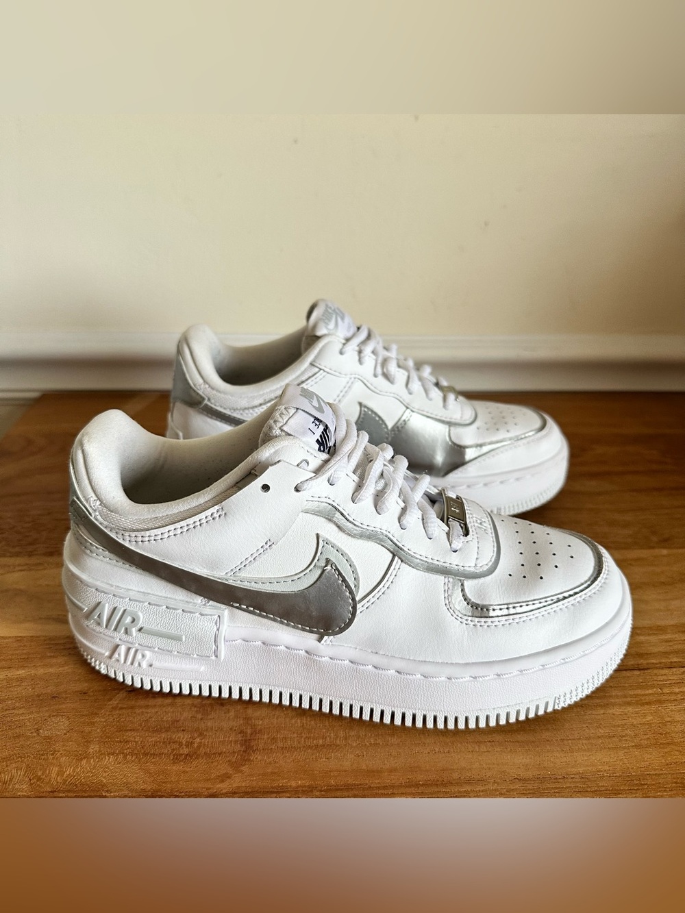 Nike White Sneakers with Metallic Silver Swoosh - Picture 2 of 11